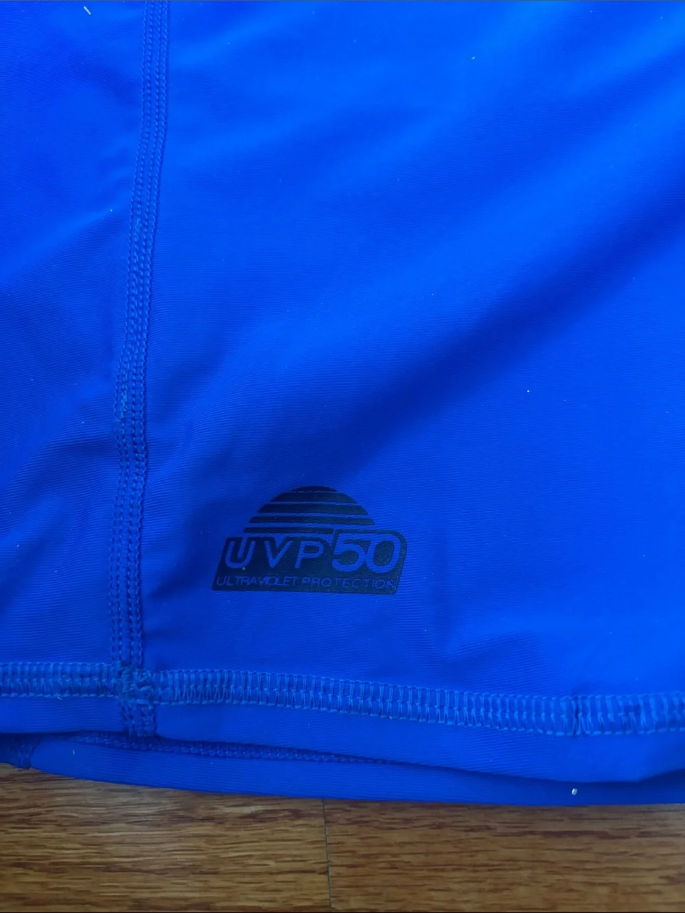 Body Glove blue and red rash guard tops
